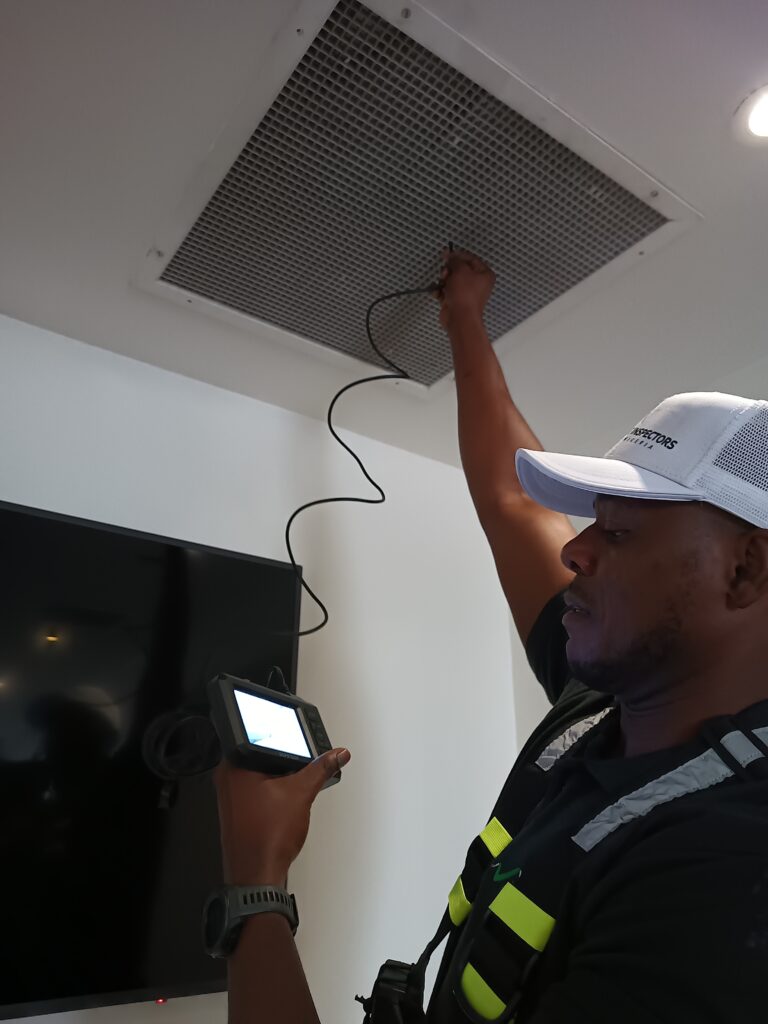Image of the CEO of Home inspectors Nigeria, Casper Ikechukwu Chidubem at work
